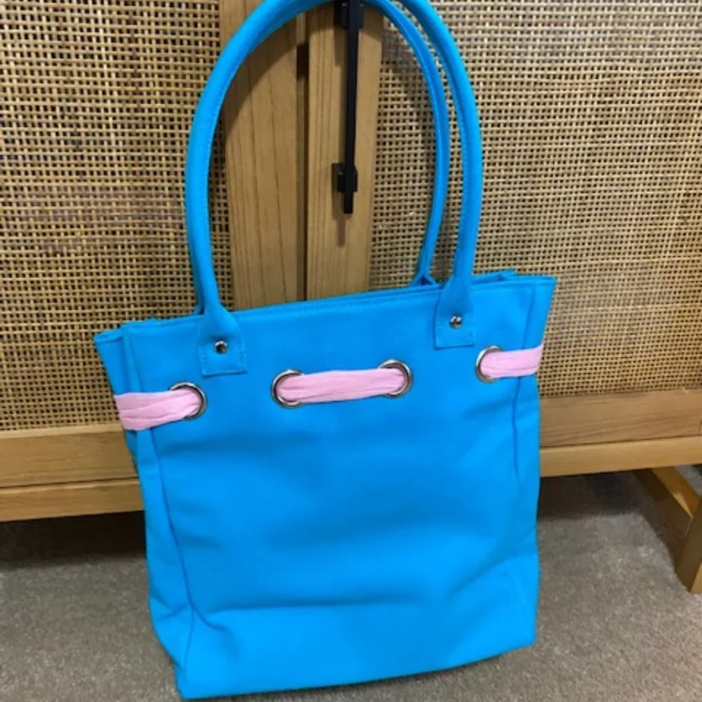 Cute bag. Blue with pink ribbon. Ralph tag. 12